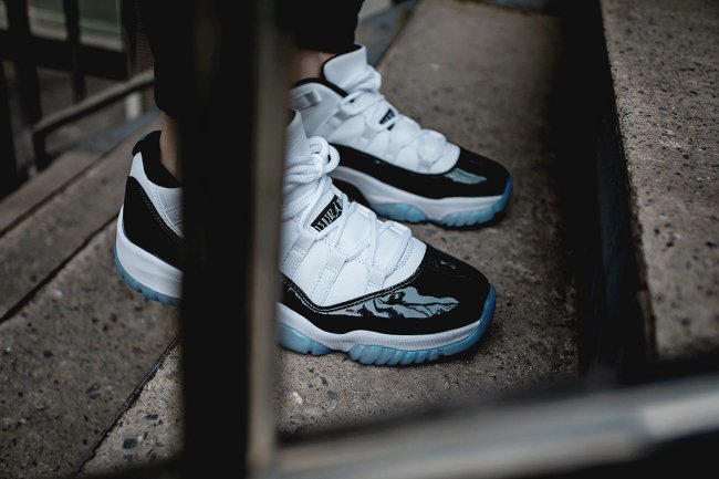 Air Jordan 11 Iridescent Sneakers in White and Black