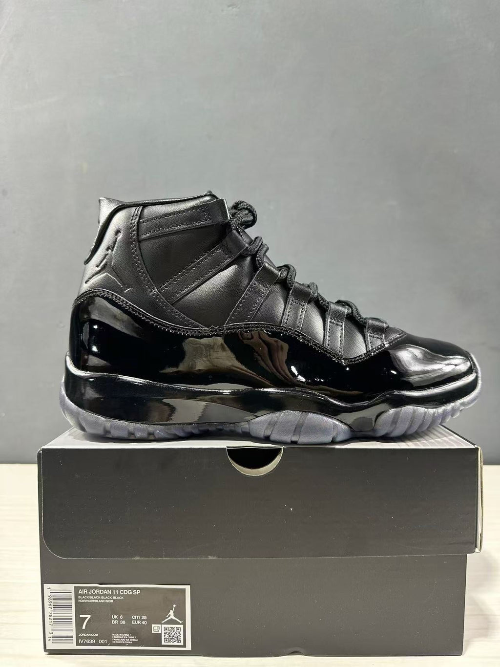Comme des Garçons × Jordan Air Jordan 11 Black Sneakers